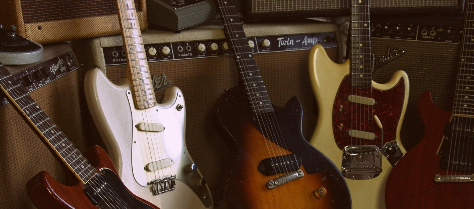 A group of 1950's and 1960's Fender and Gibson vintage guitars