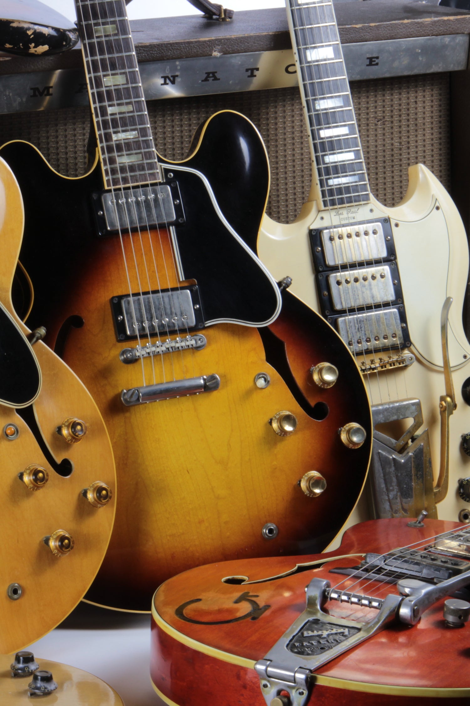 1963 Gibson ES-335 1961 Gibson SG Les Paul Custom and Gretsch 6120