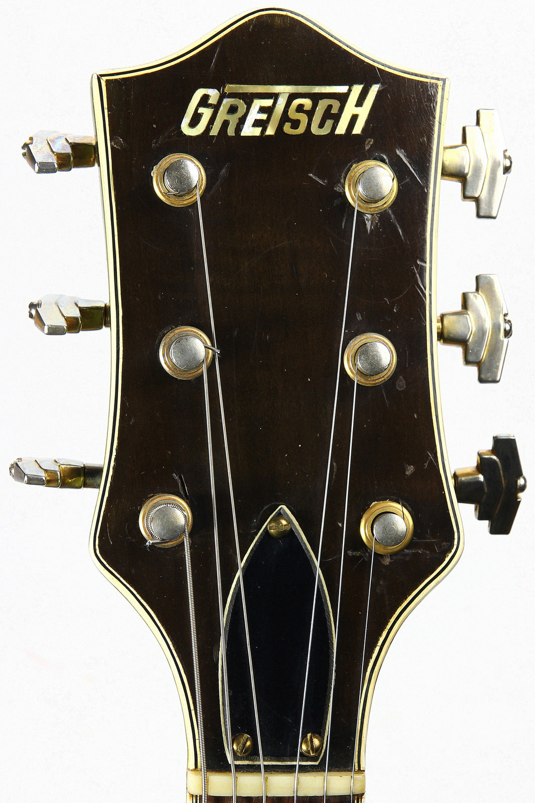Gretsch headstock with brand logo and Grover imperial tuners