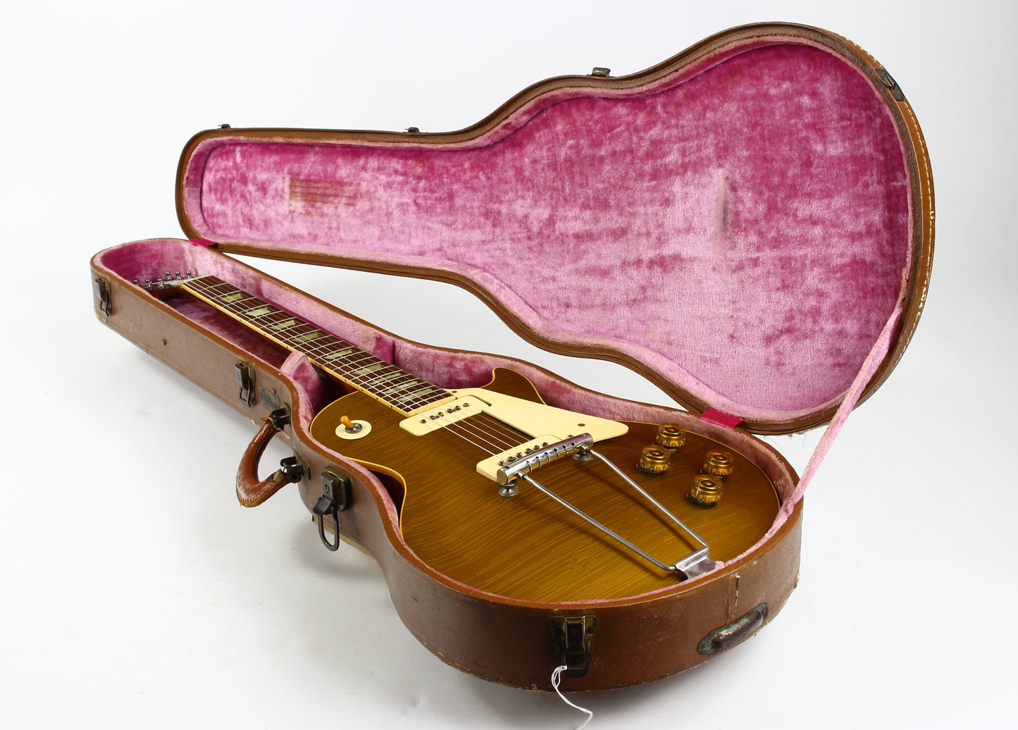 1953 Gibson Les Paul Guitar in a pink-lined case on a white background