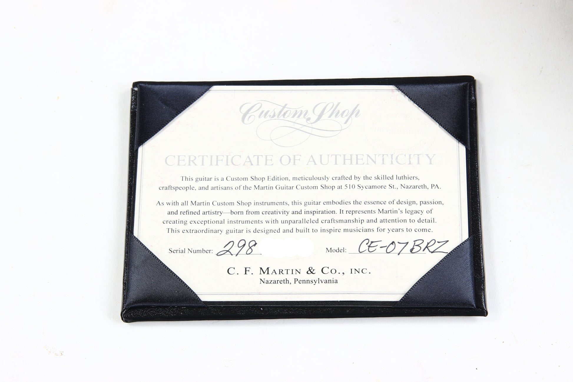 Certificate of Authenticity for a C.F. Martin guitar on a white background