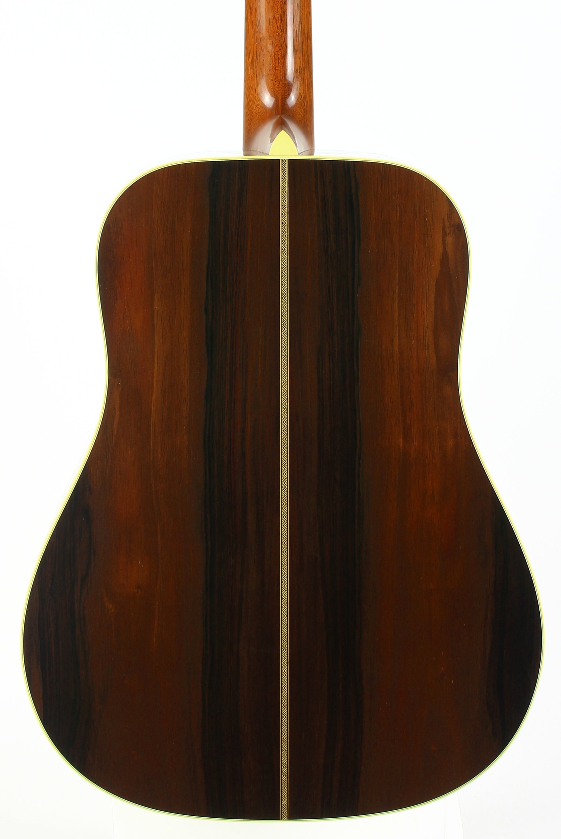 Back view of a Martin Brazilian Rosewood acoustic guitar on a white background
