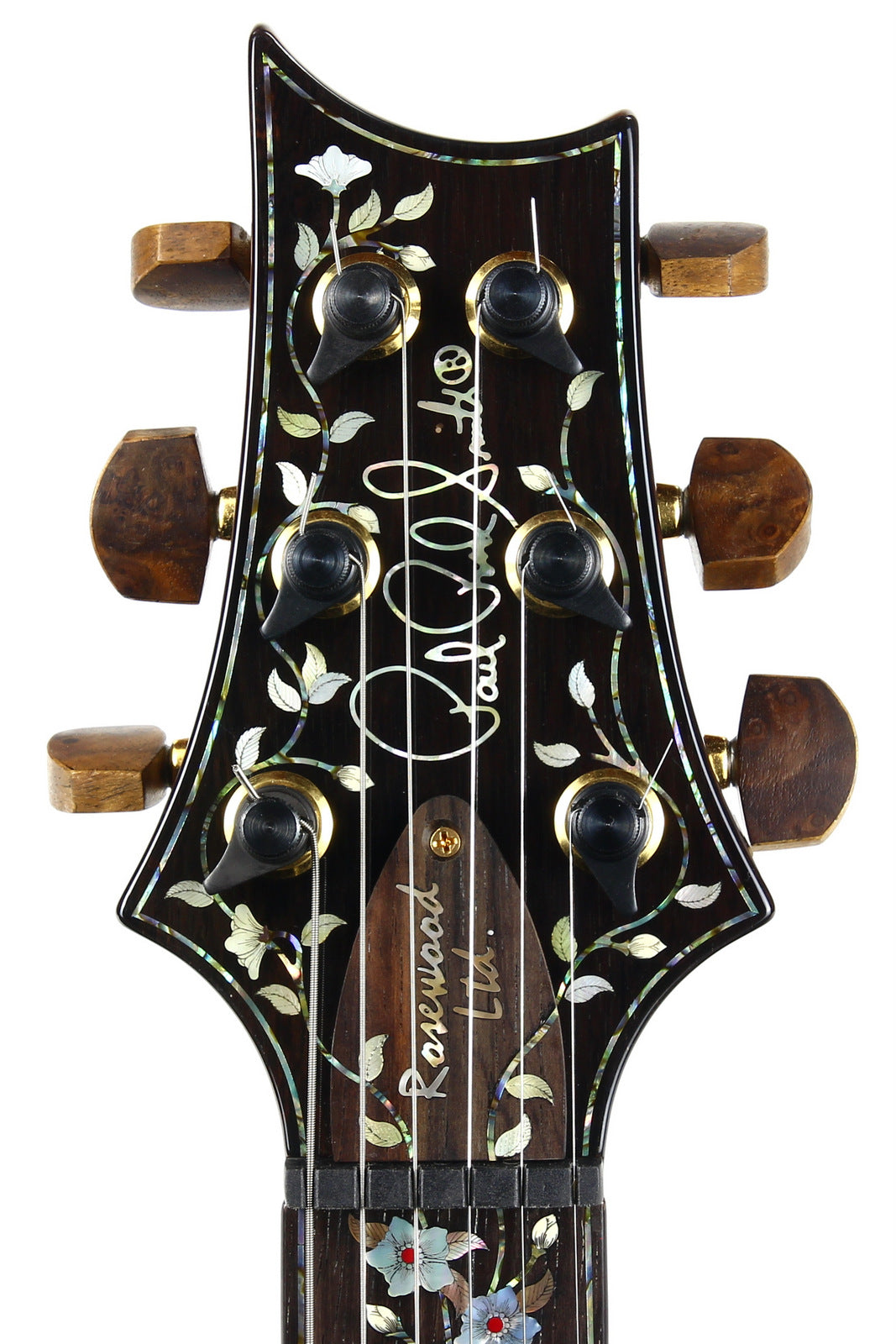 PRS Paul Reed Smith headstock with brand logo vine inlays