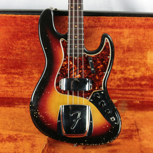 Nicely worn 1964 Fender Jazz Bass in Sunburst with Tortoise guard